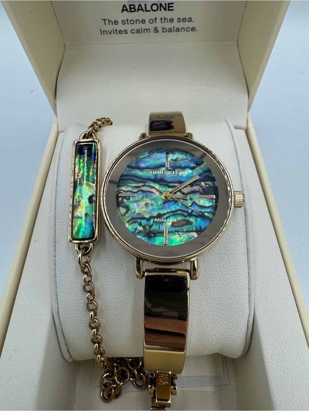 Anne Klein Gold-Tone Watch with Iridescent Abalone Dial and Bracelet Accent